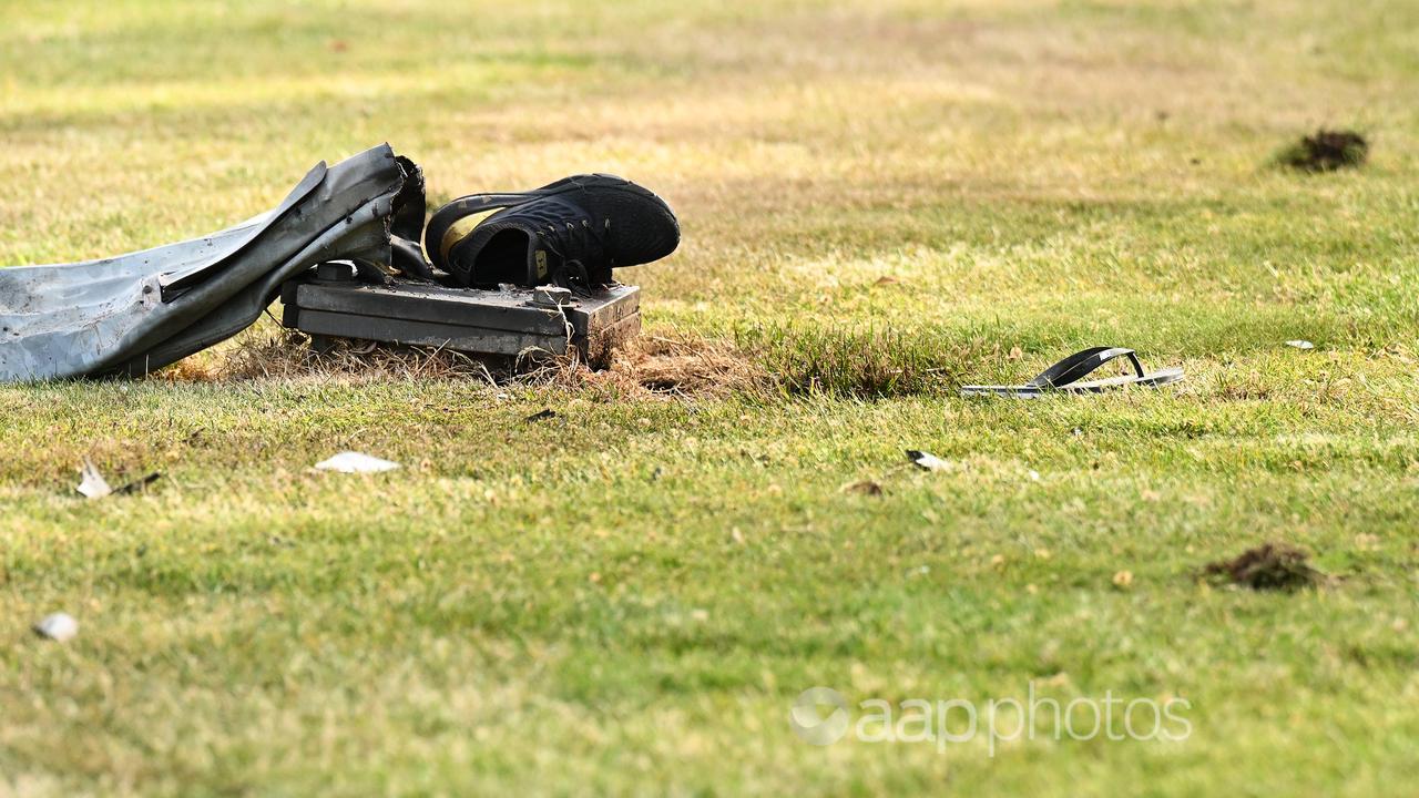 A shoe and thong are seen at the scene of a the crash last month.