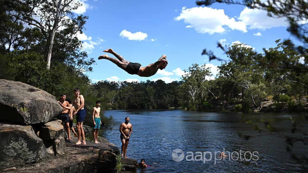People cool off at Lake Parramatta west of Sydney.
