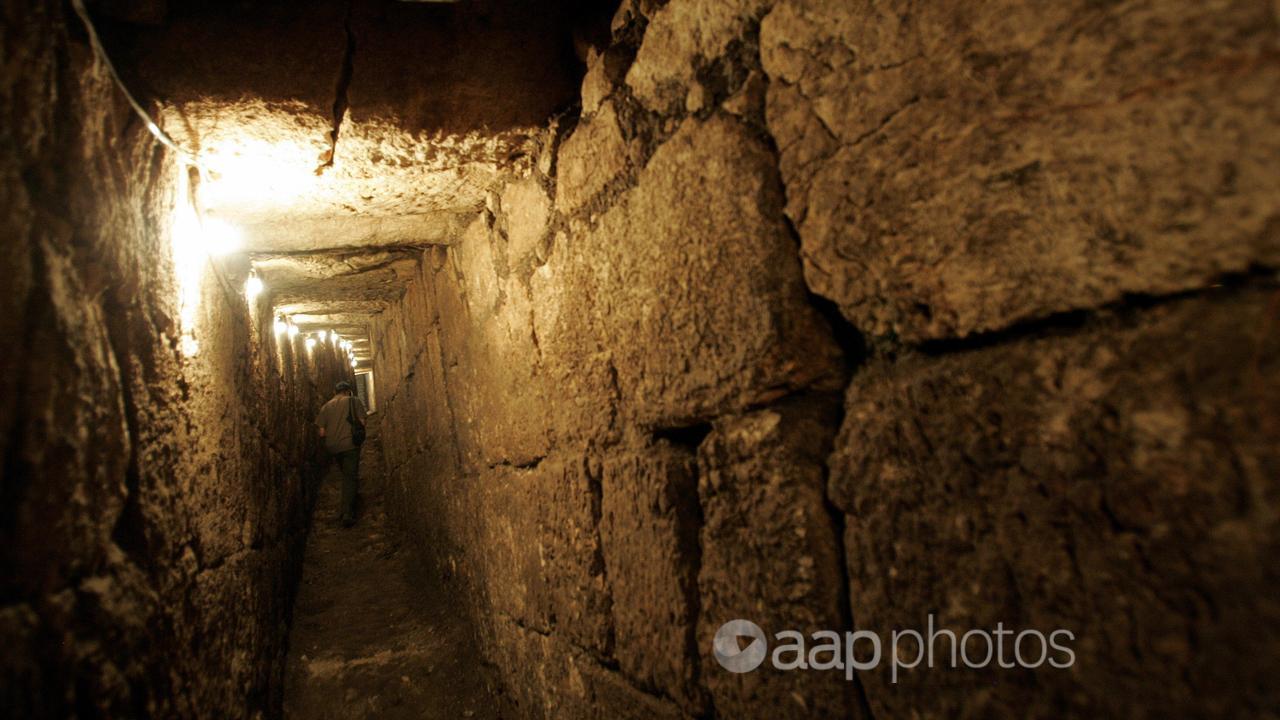 A man wlaks along an historic tunnel (file image)
