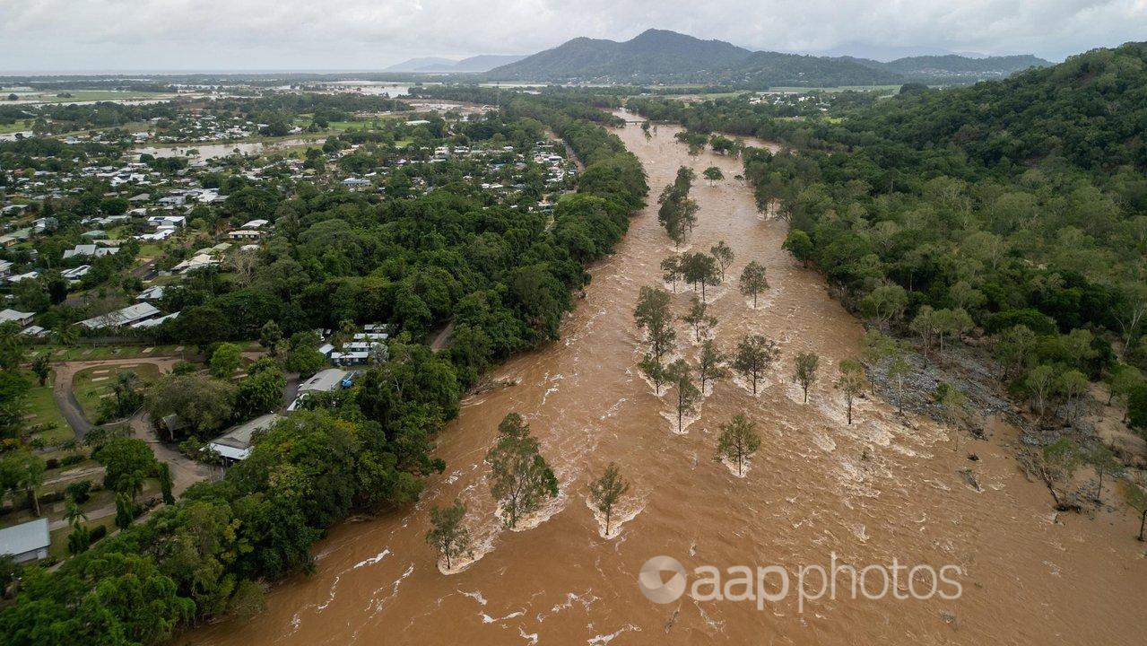 Aerial view of floodwater at Lake Placid in Cairns