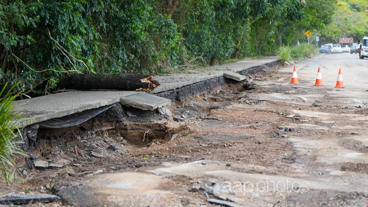 Flood-damaged road in Cairns.