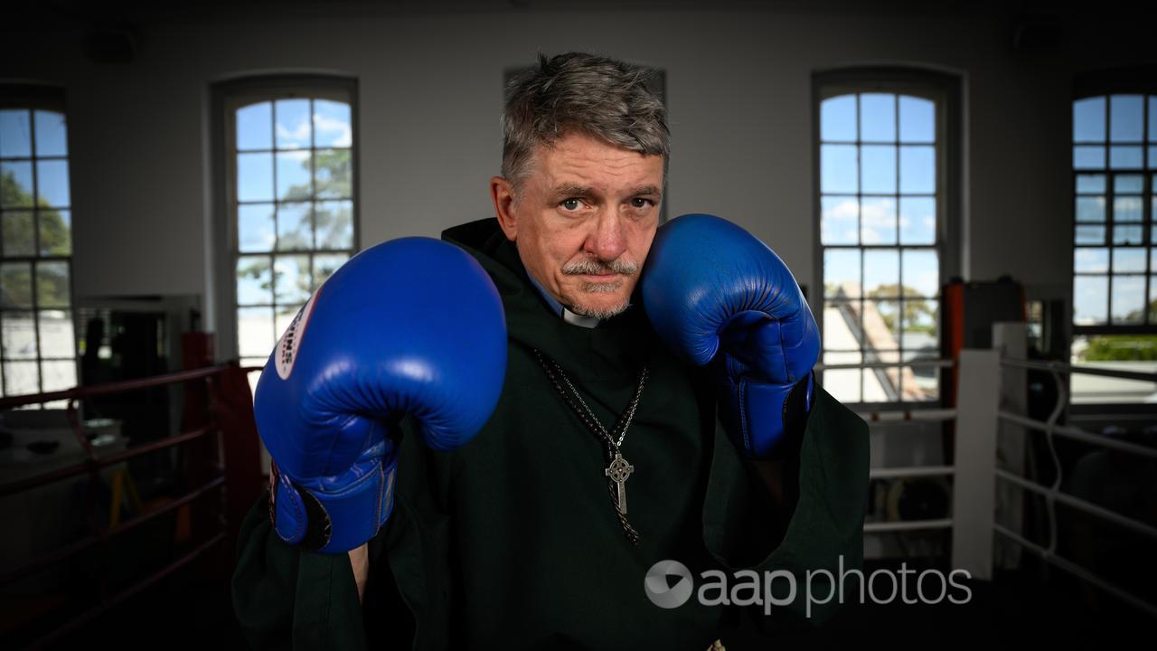 Australian pro boxer and priest, 61-year-old Father Dave Smith.