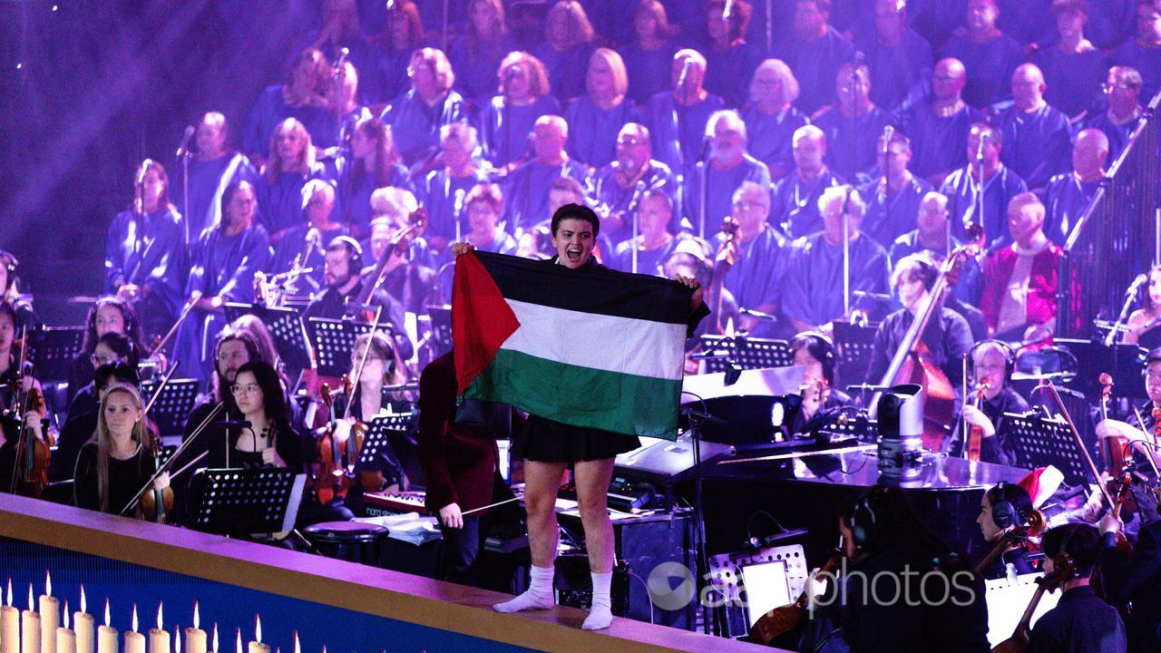 Pro-Palestine protesters interrupt the Carols by Candlelight.