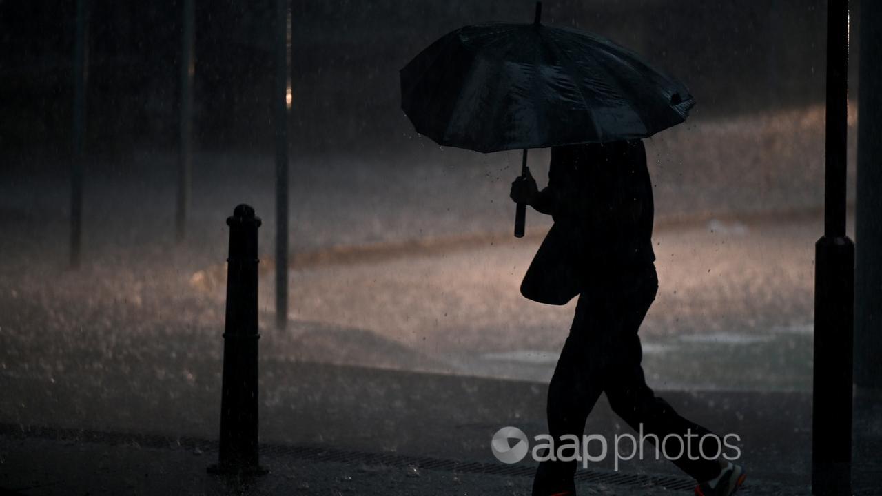 A file photo of a pedestrian in the rain