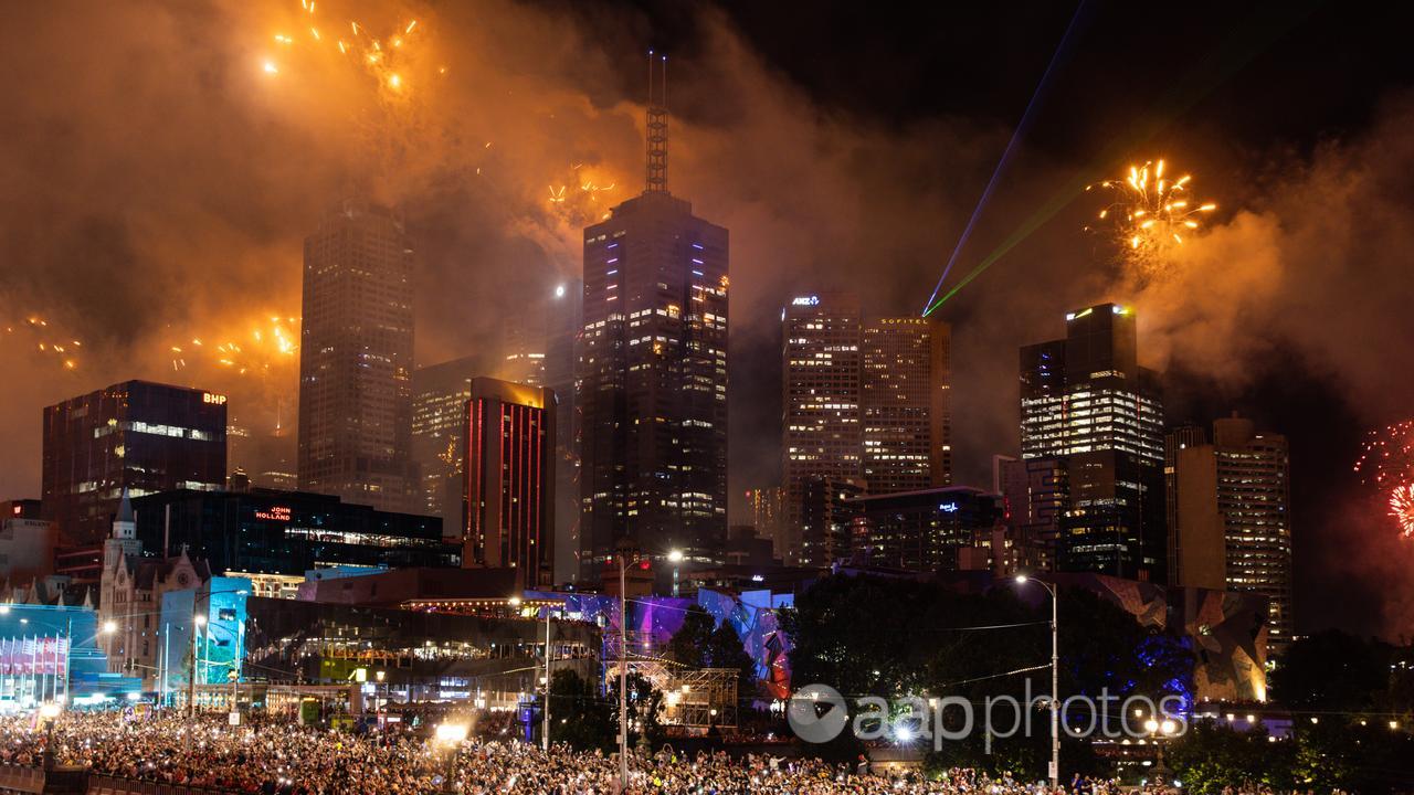 Fireworks on the buildings along the Yarra River