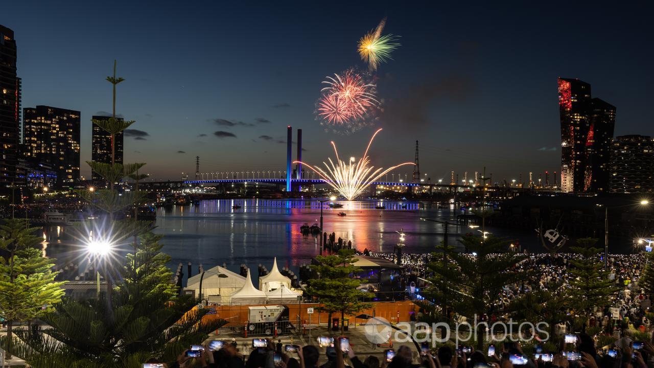 Fireworks are seen above the Bolte Bridge in Dockland