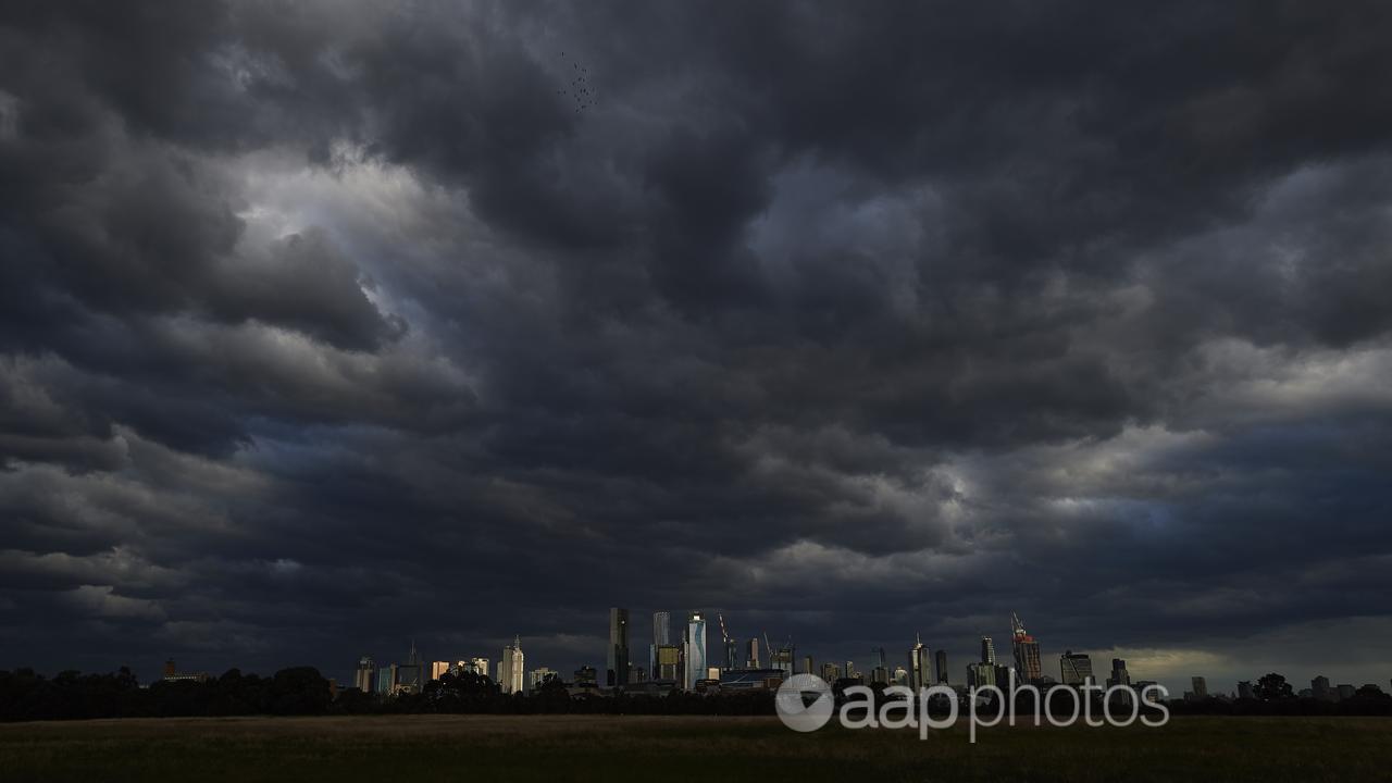 Storm clouds are seen over Melbourne's CBD (file image)