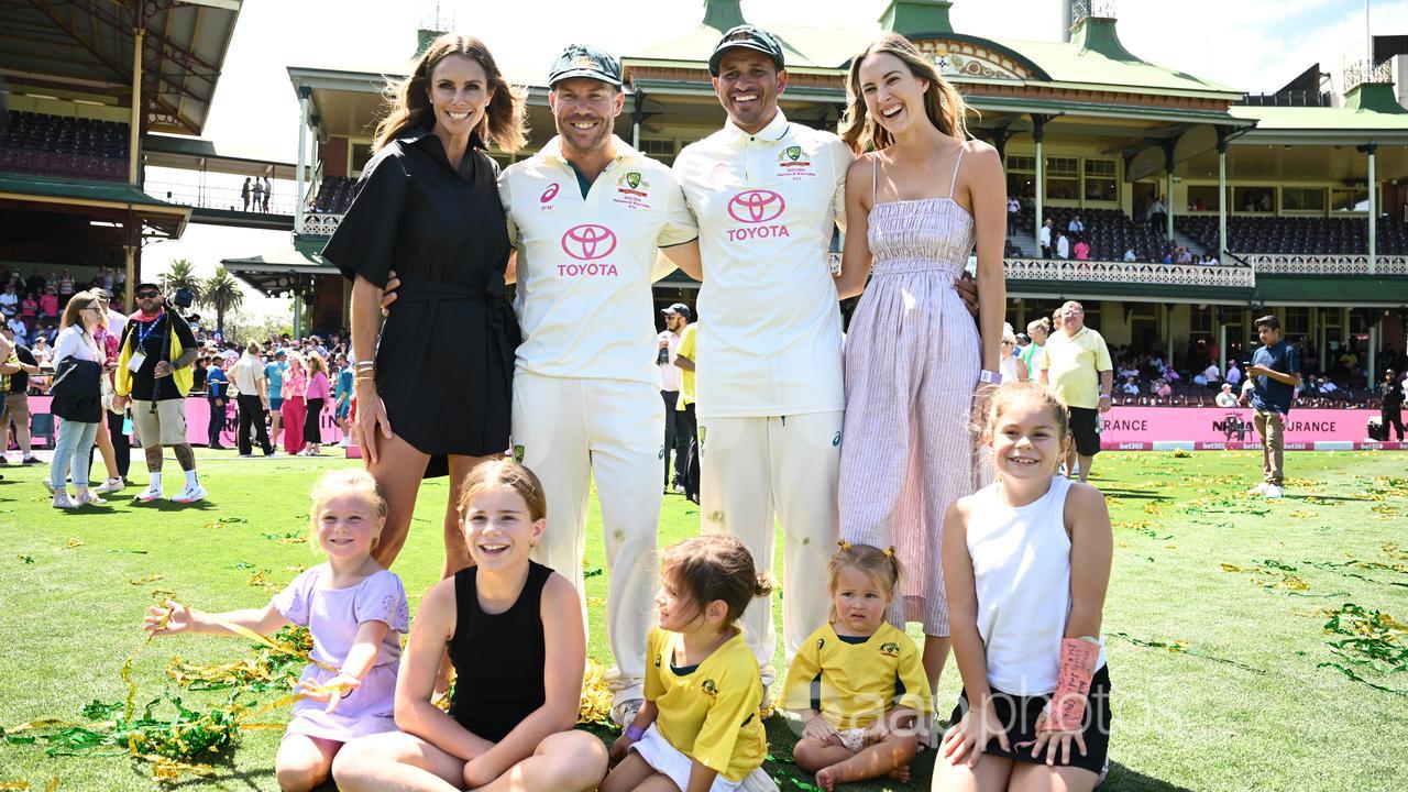 The Warner and Khawaja families pose on the SCG turf.