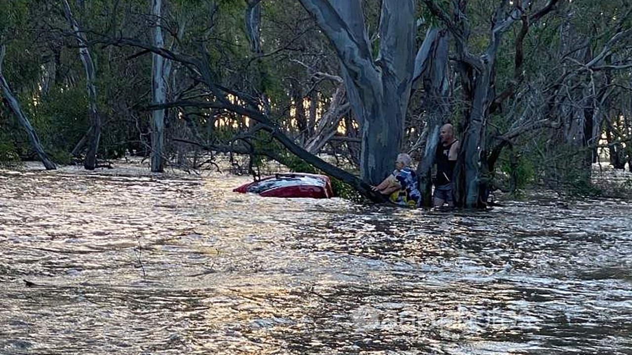 A 74-year-old woman was rescued from floodwaters at Elmore, Victoria.
