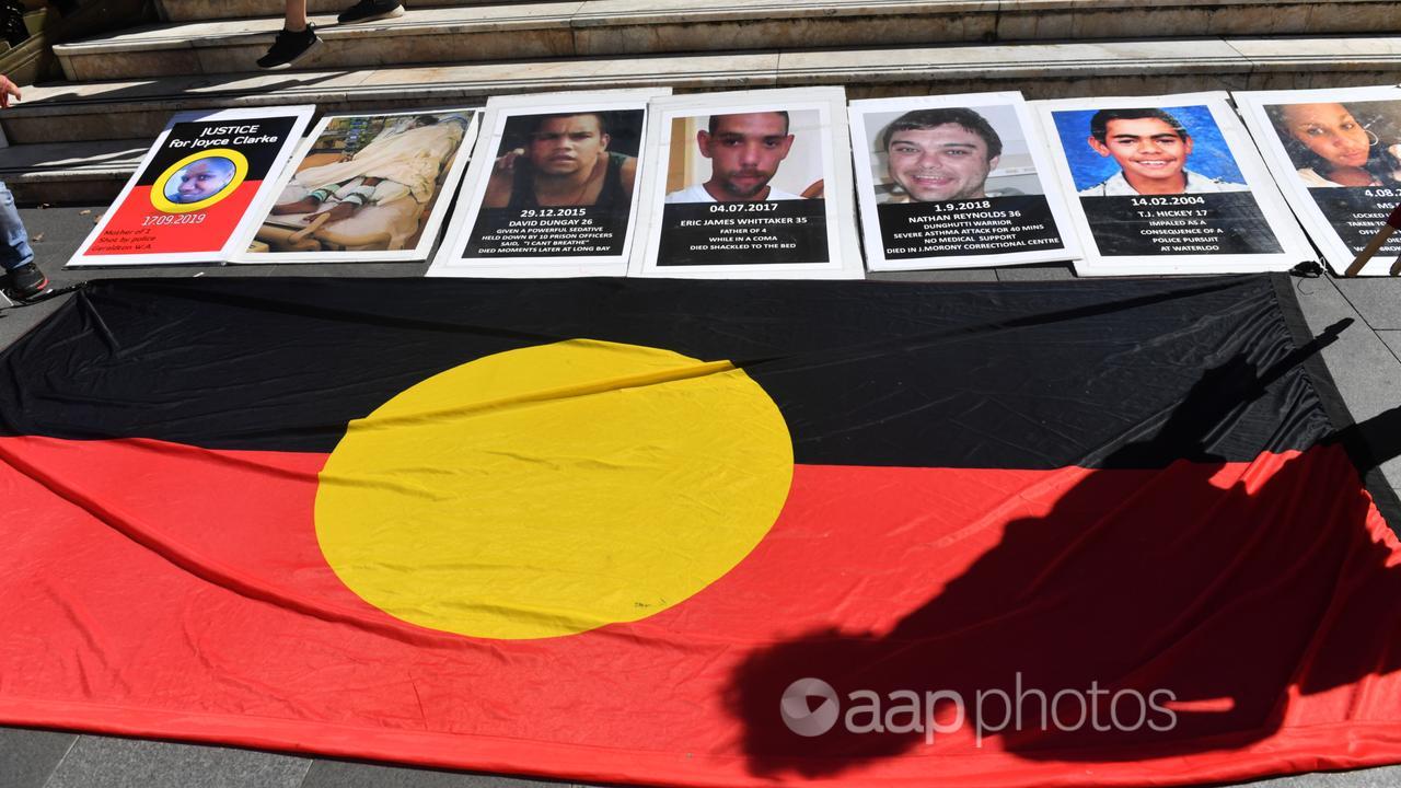 Iindigenous flag and signs of people who died in custody (file image)