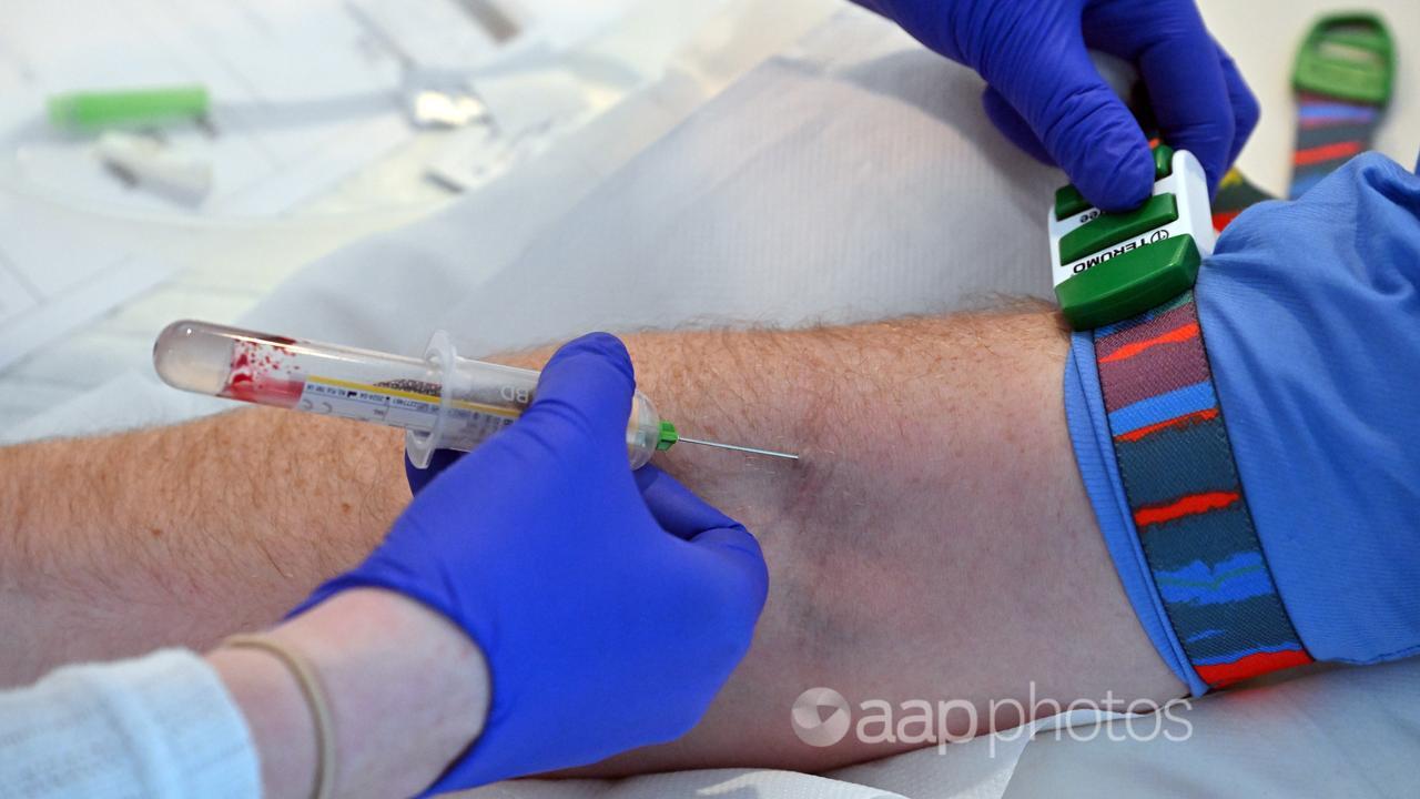 A man has a blood test taken to screen for prostate cancer (file)