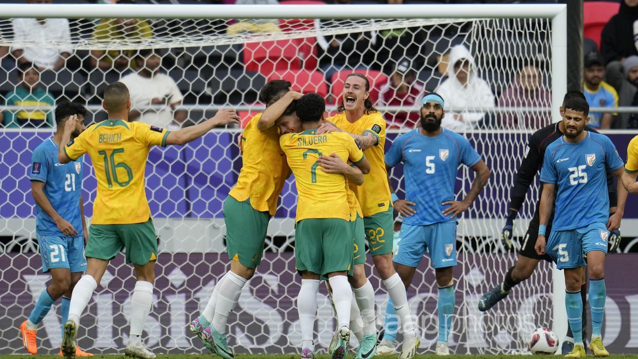 Australia celebrate Jordy Bos's goal against India in the Asian Cup.