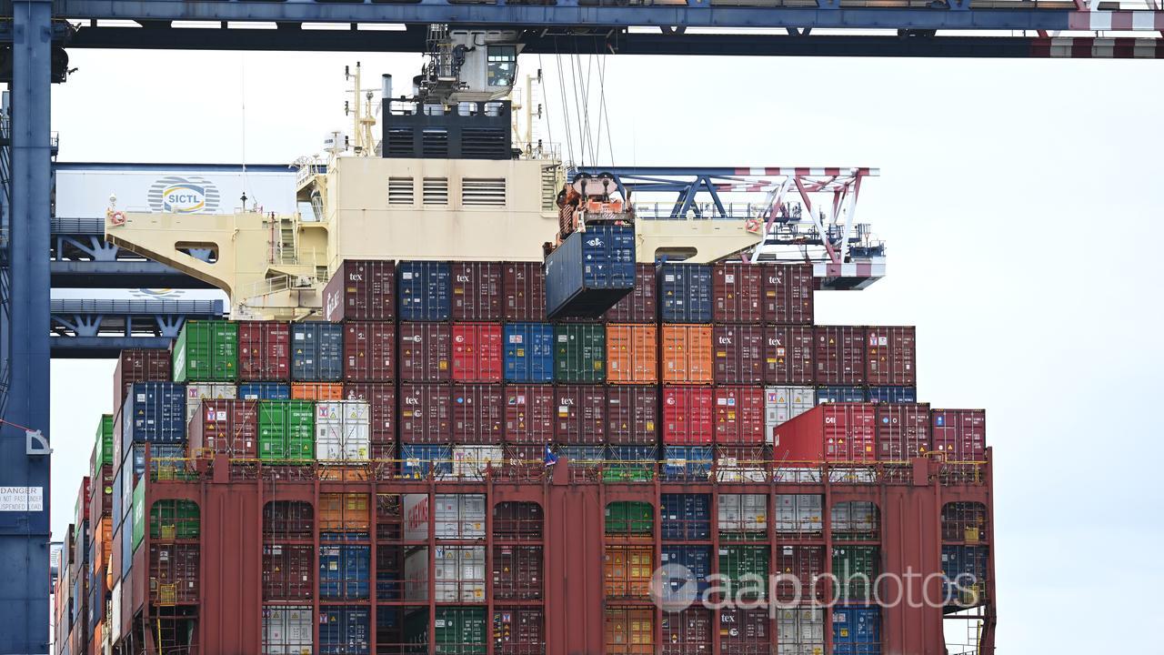 A container ship is unloaded at Port Botany in Sydney.