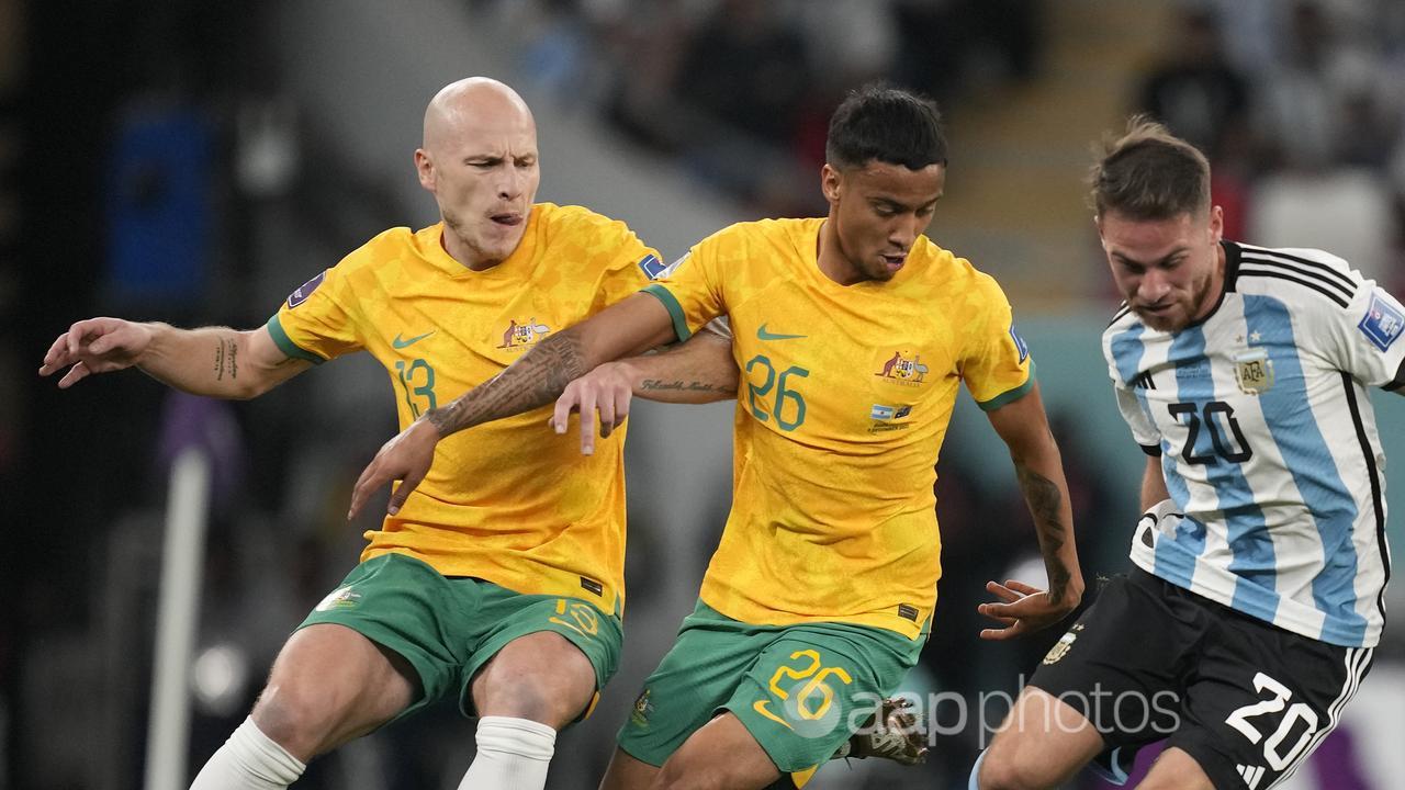 Aaron Mooy (13) and Keanu Baccus (26) for the Socceroos v Argentina.
