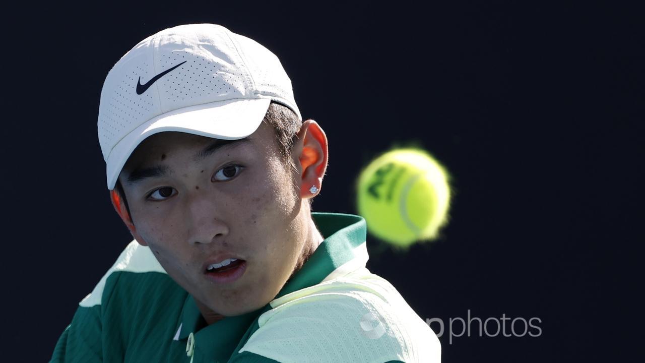 Chinese teenager Juncheng Shang in Australian Open action.