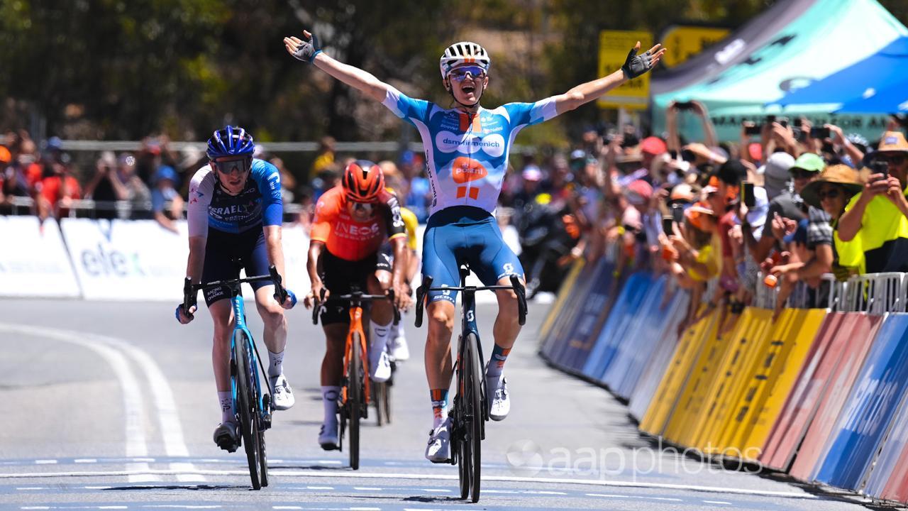 Oscar Onley crosses the line to win stage five of the Tour Down Under.