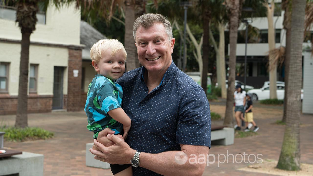Australian entertainer and singer Simon Pryce and his son Asher.