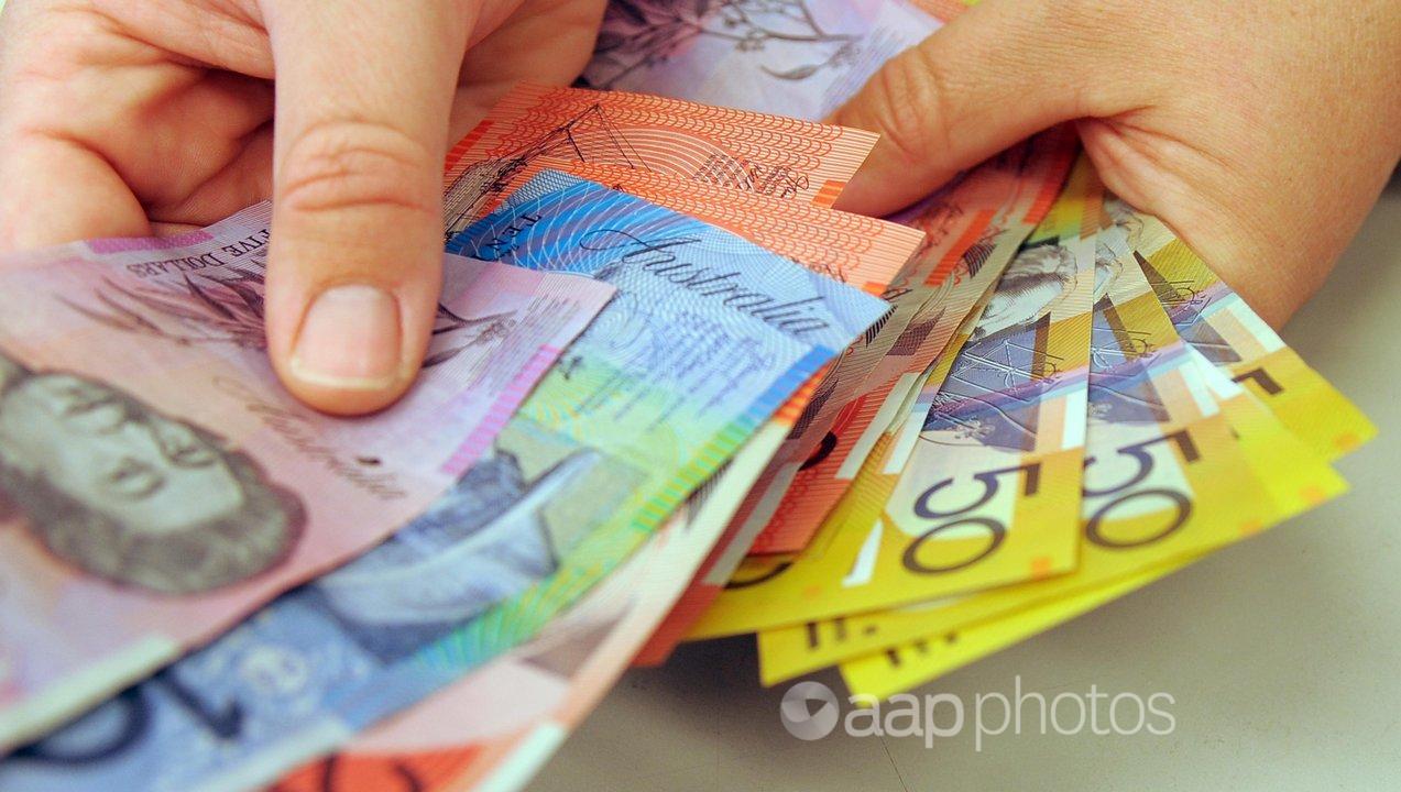 Banknotes being counted in Canberra