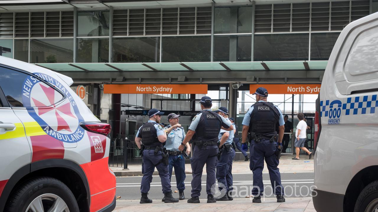 Police stand outside North Sydney station