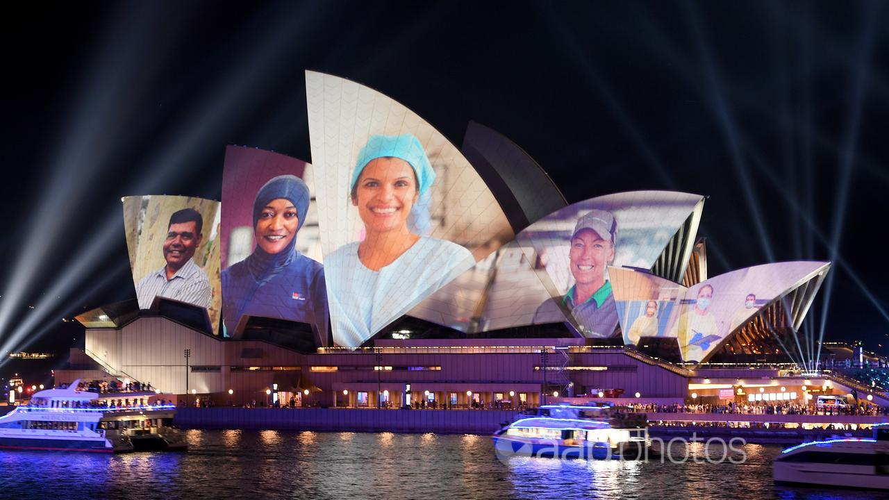 Images of essential workers were projected on the Opera House in 2021.