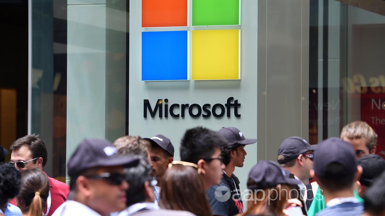 Customers outside a Microsoft store (file image)