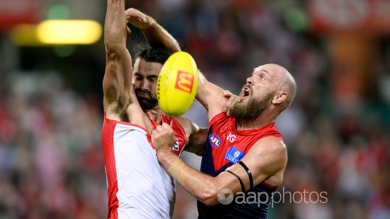 Grundy Swans surge past Melbourne in AFL season opener