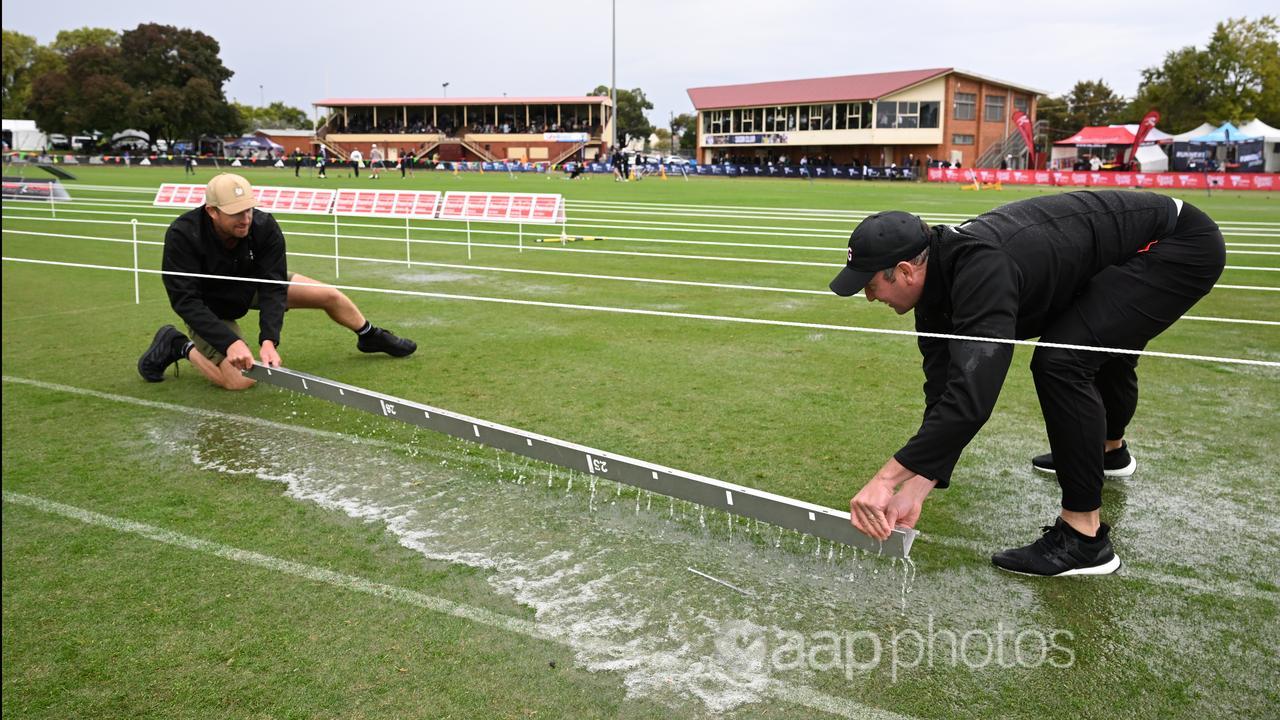 People in the rain at the Stawell Gift.
