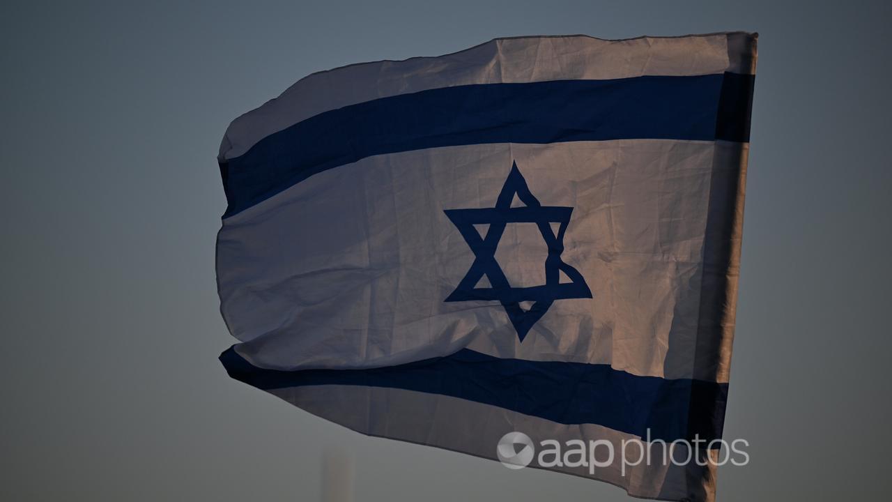 An Israeli flag seen during a vigil at Rodney Reserve in Sydney.
