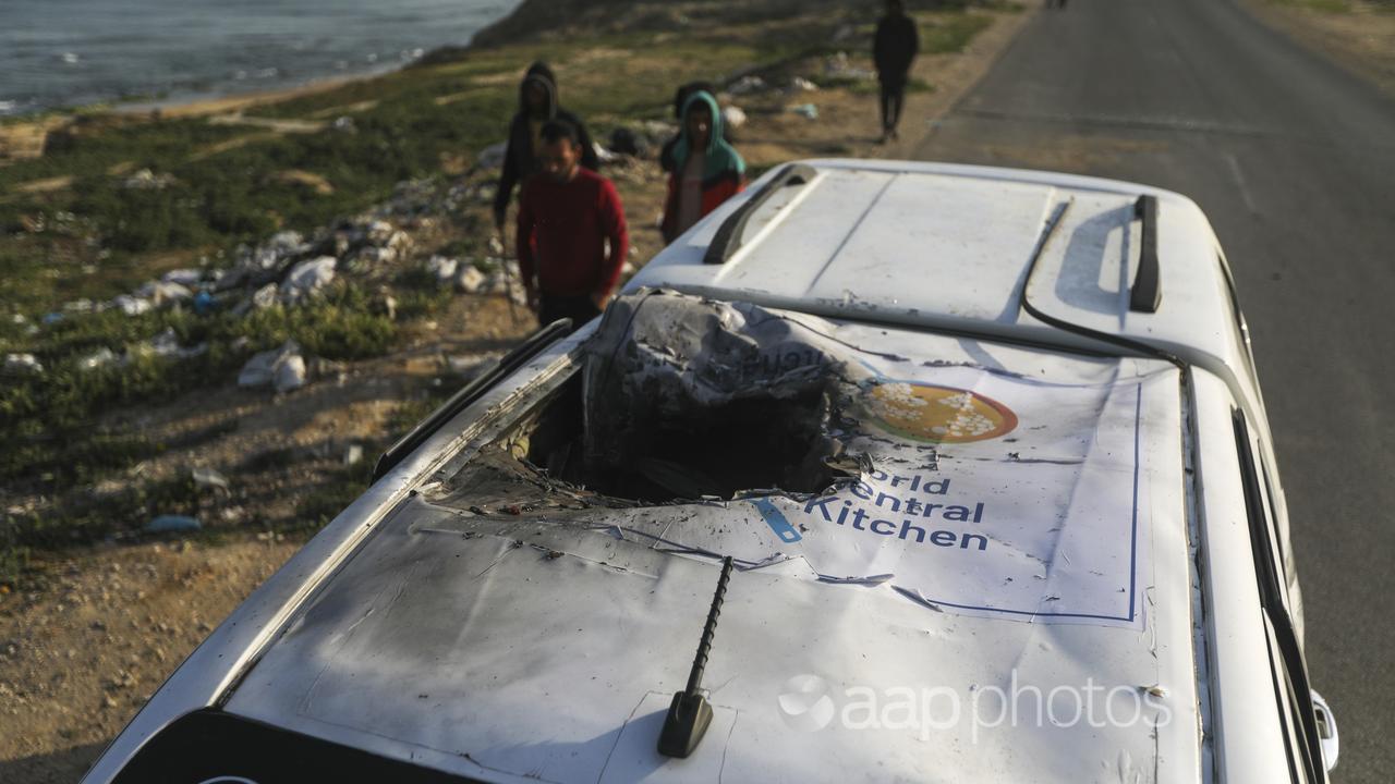 A World Central Kitchen vehicle hit by an Israeli air strike.