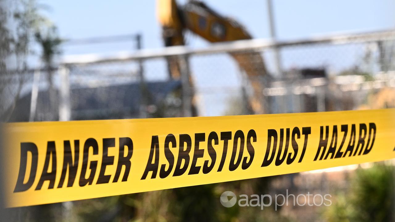 Warning tape for asbestos at a park in Coburg North