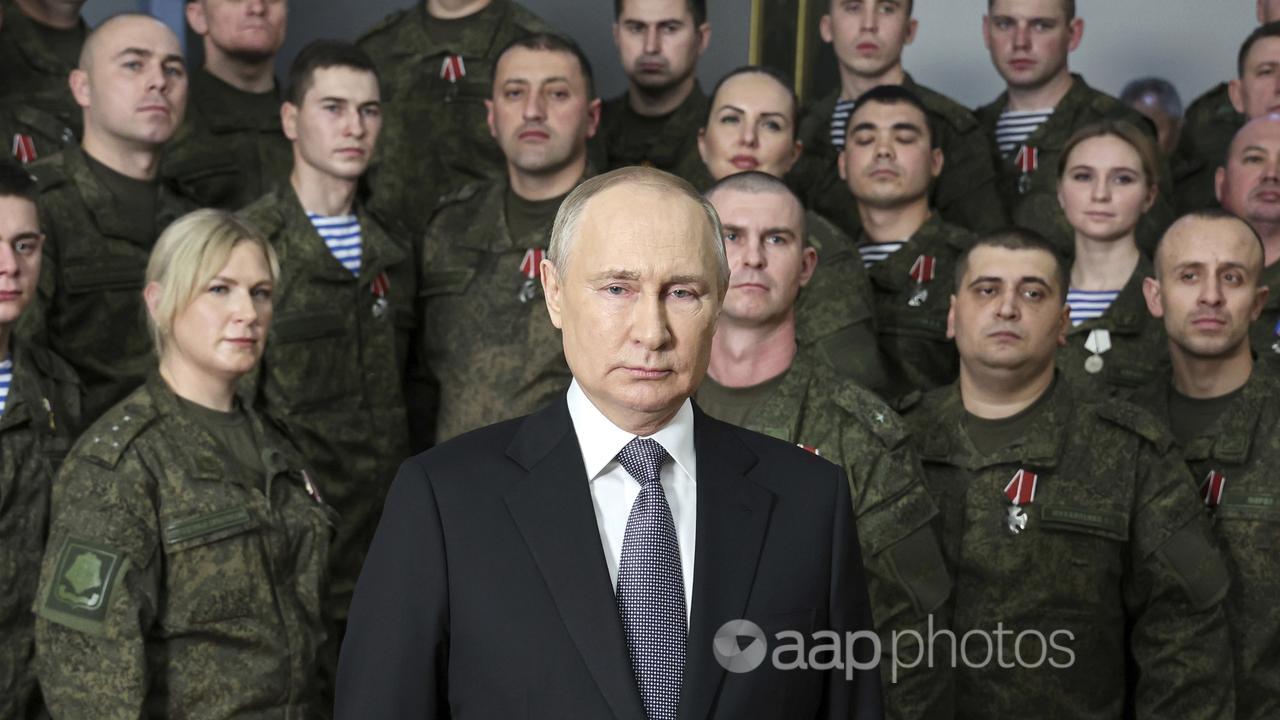 Vladimir Putin with Russian soldiers (file image)