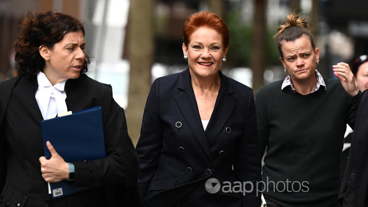 Pauline Hanson (centre) arrives at the Federal Court
