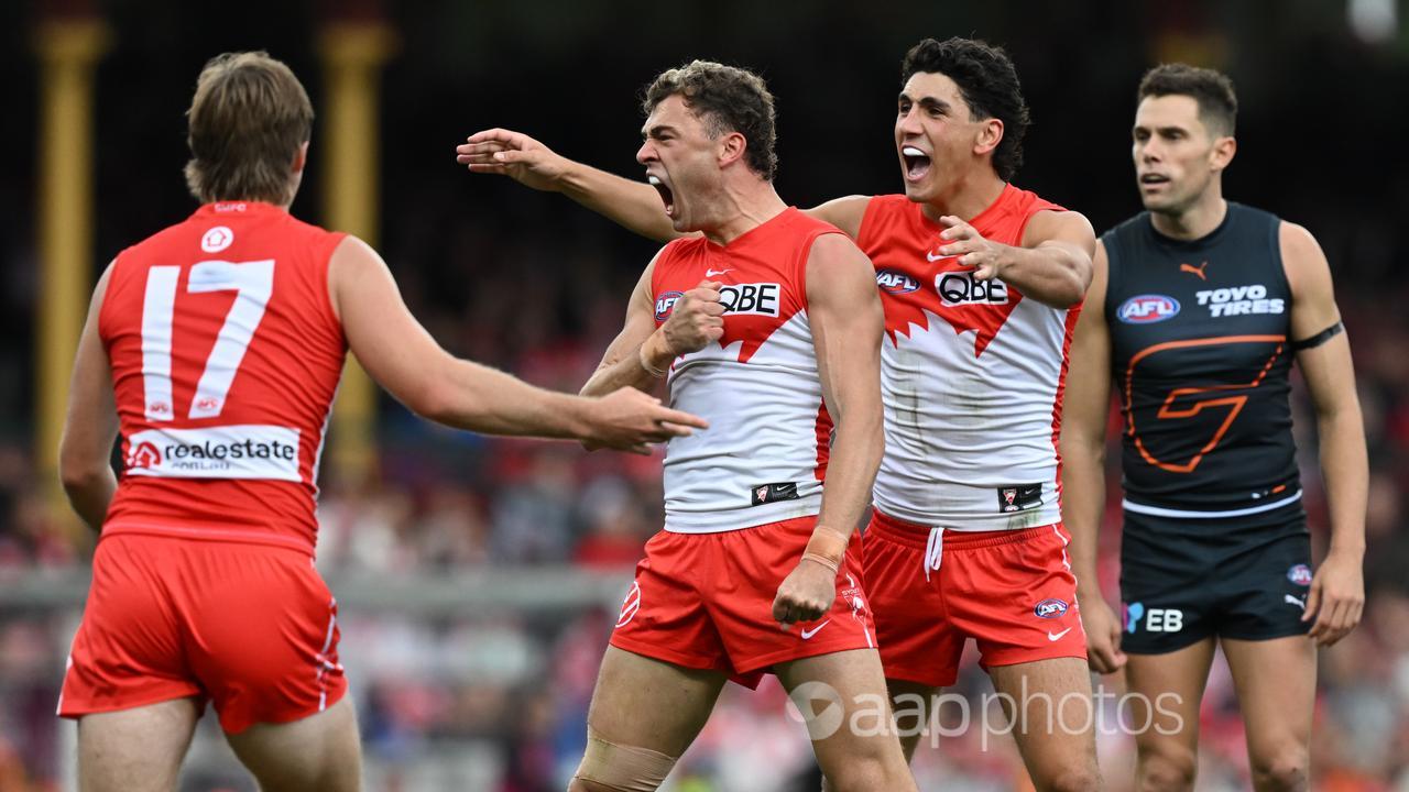 Will Hayward celebrates for the Swans against GWS.
