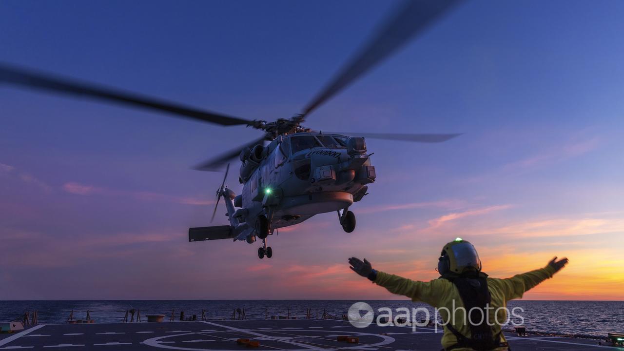 Seahawk helicopter lands on HMAS Hobart