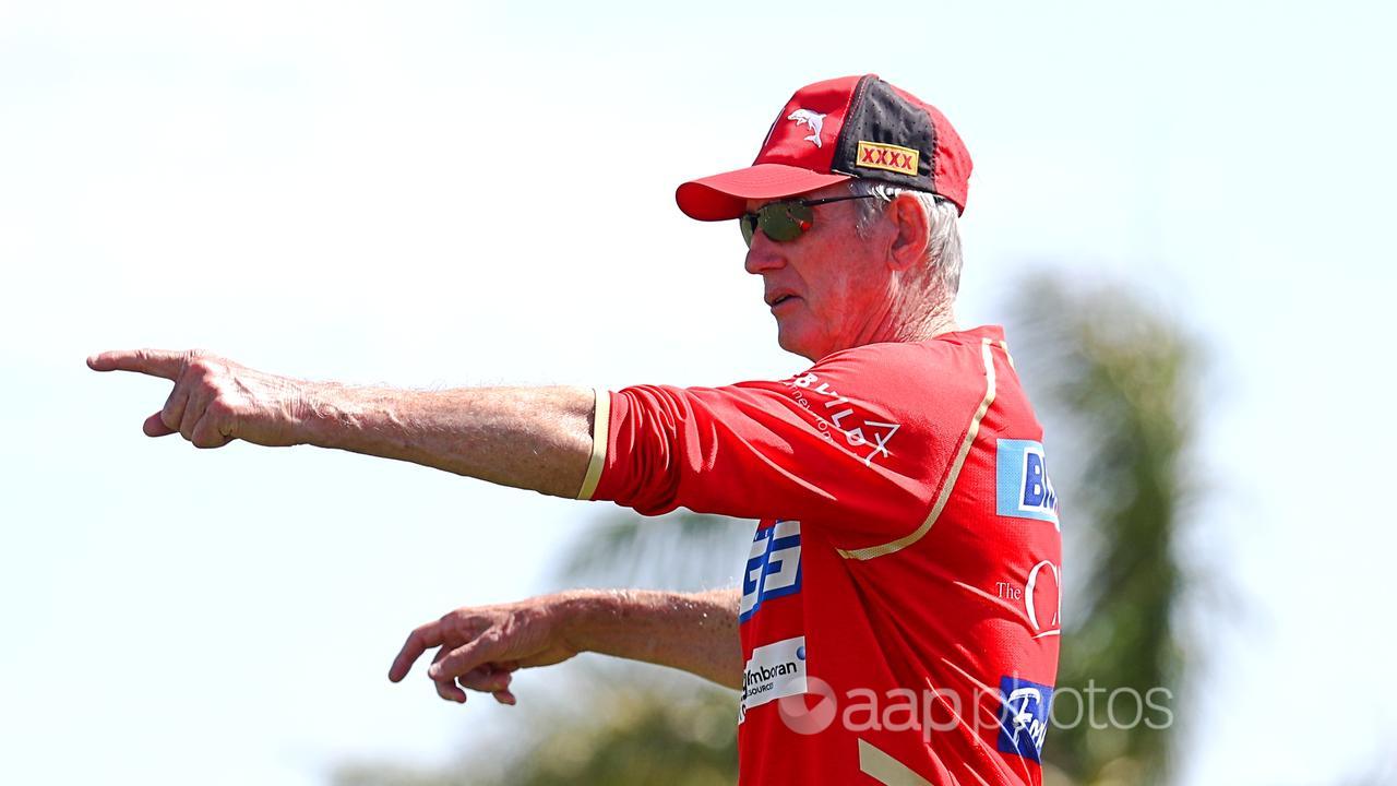 Wayne Bennett points the way for the Dolphins.