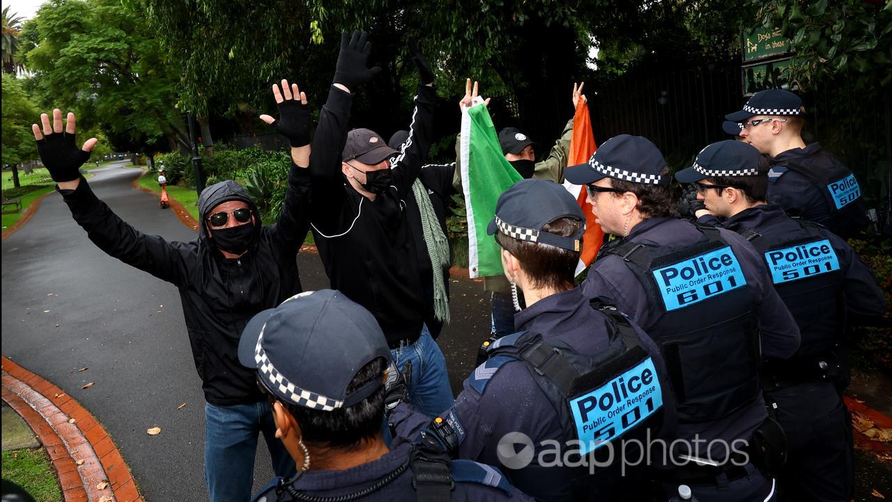 Police and protesters at Melbourne rally