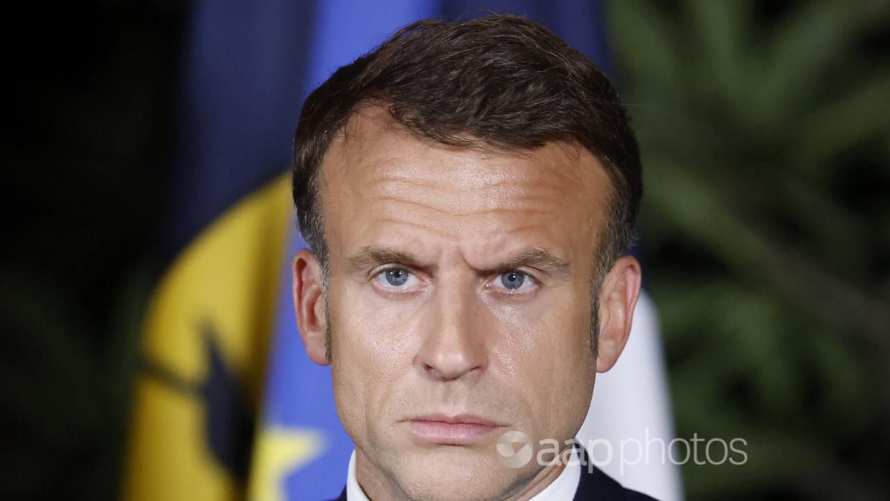 French President Emmanuel Macron delivering a speech in Noumea