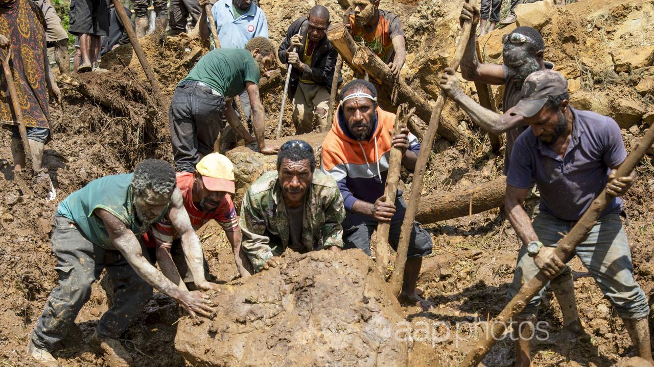 More than 2000 people are feared dead in a landslide in PNG.