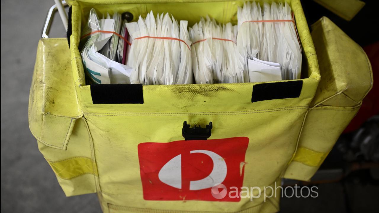 Mail loaded onto a motorbike at the Australia Post Nepean facility 