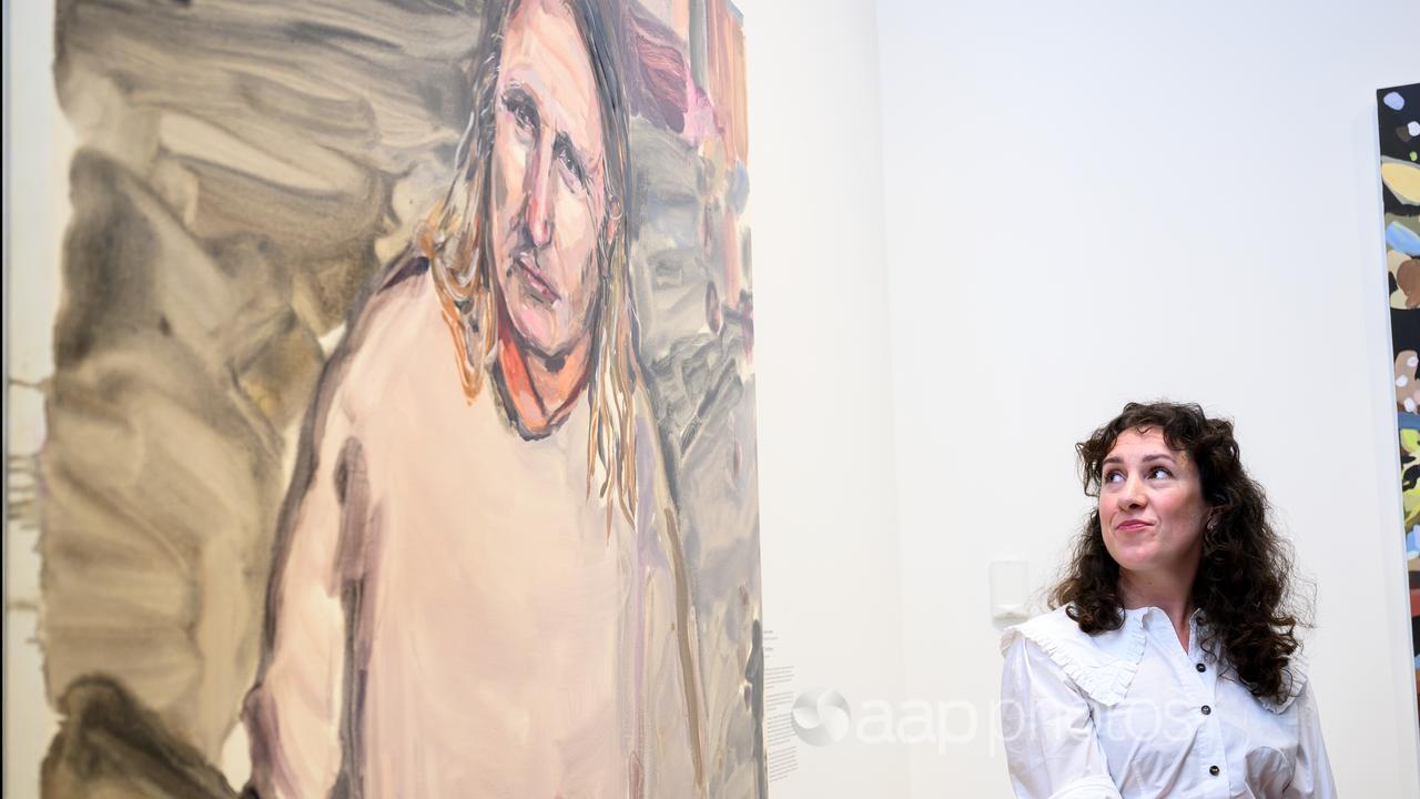 Laura Jones with Archibald Prize winning portrait