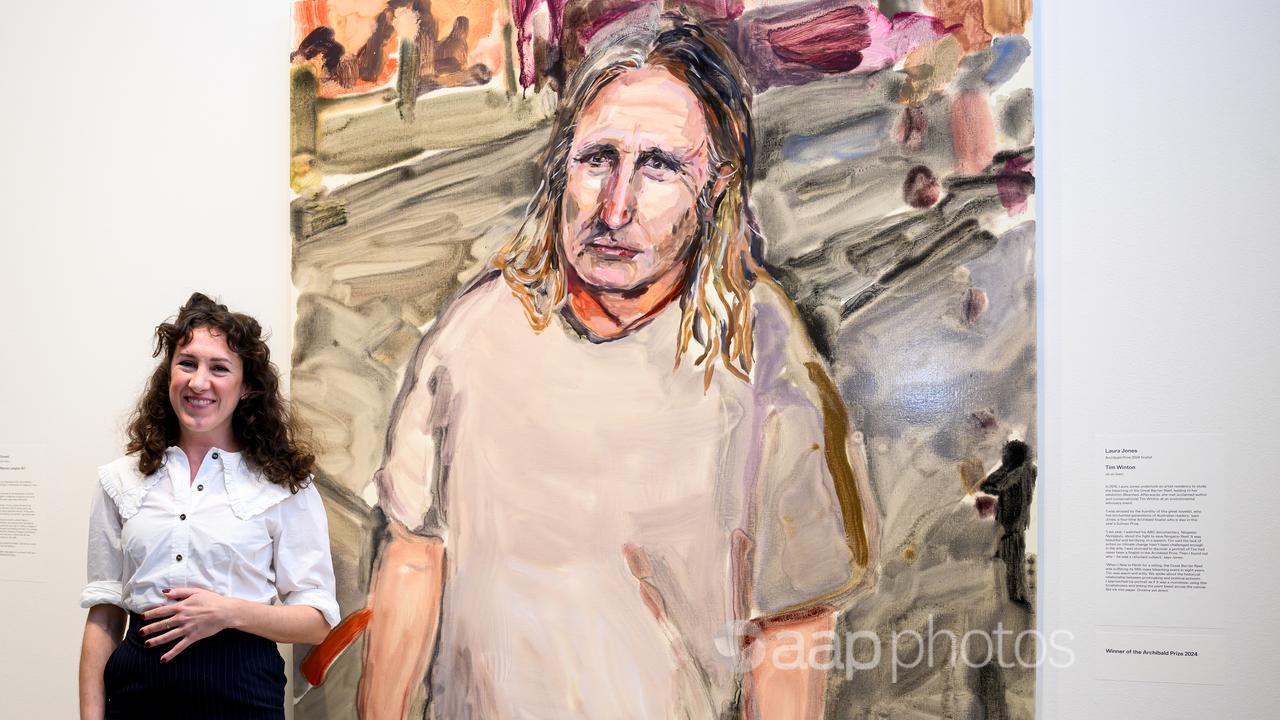 Artist Laura Jones with her Archibald Prize- winning painting