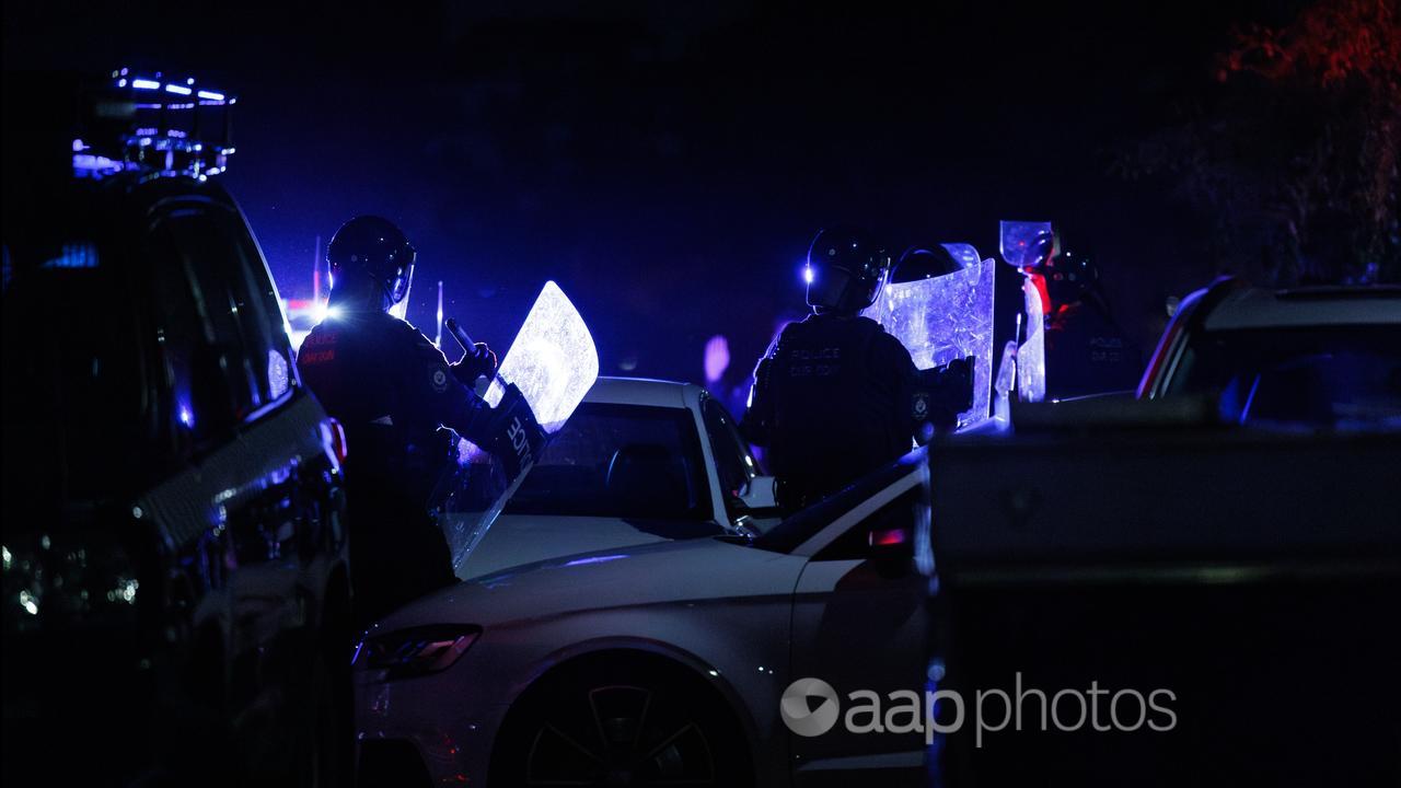 Police at Wakeley church riot