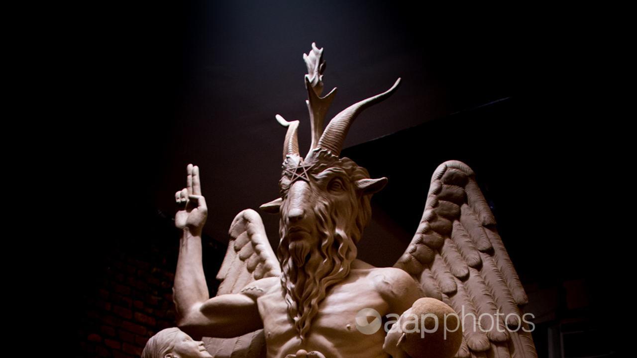 An image of a bronze statue of of the invented pagan deity Baphomet.