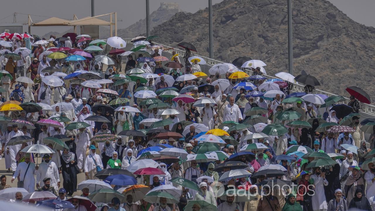 Pilgrims shelter from the sun near Mecca.