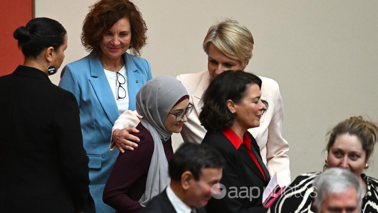 Labor senator Fatima Payman is embraced by minister Tanya Plibersek