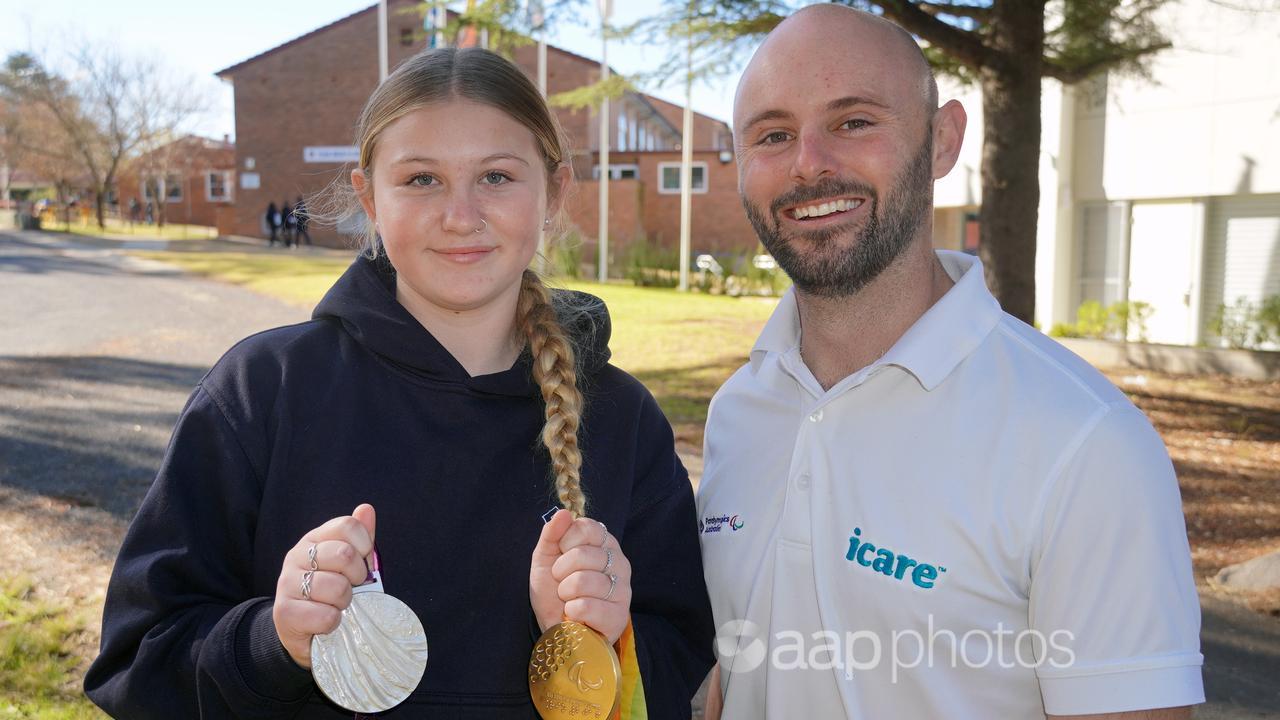 Student Willow Larkham with Scott Reardon.