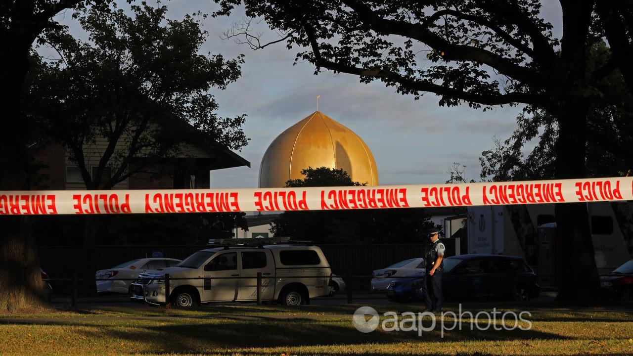 Police officer in front of the Al Noor mosque in Christchurch, NZ