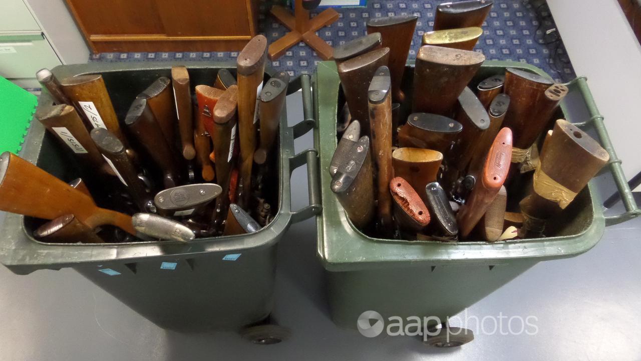 Guns in bins after being handed in to Tasmanian police. 