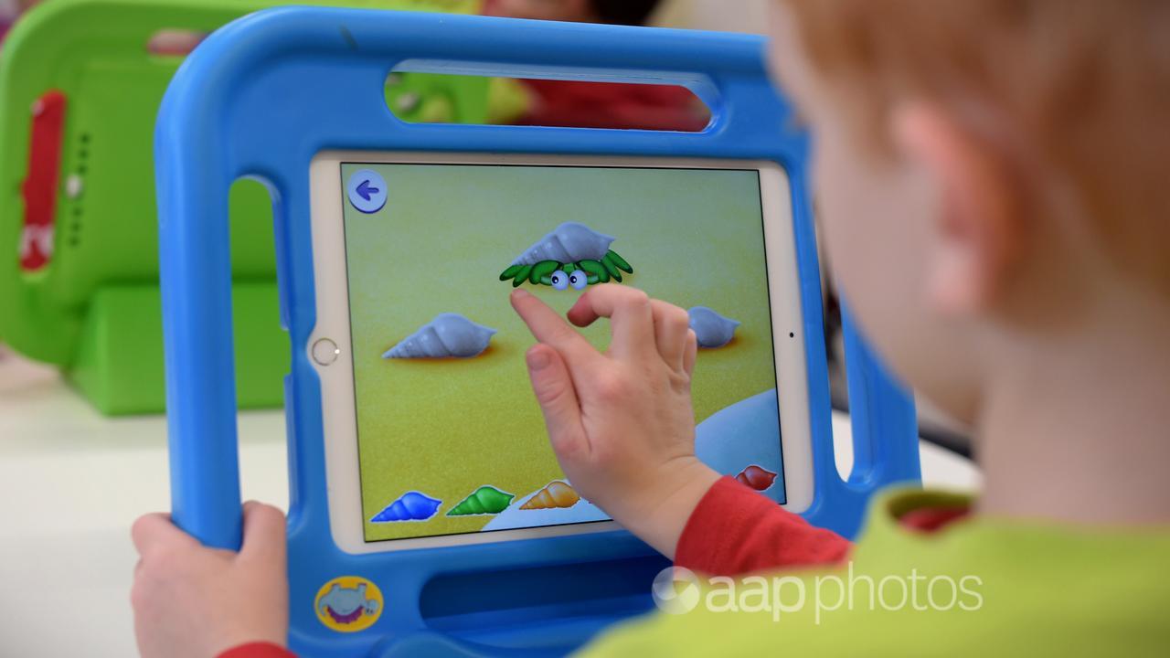 A child playing at an early childhood centre (file)