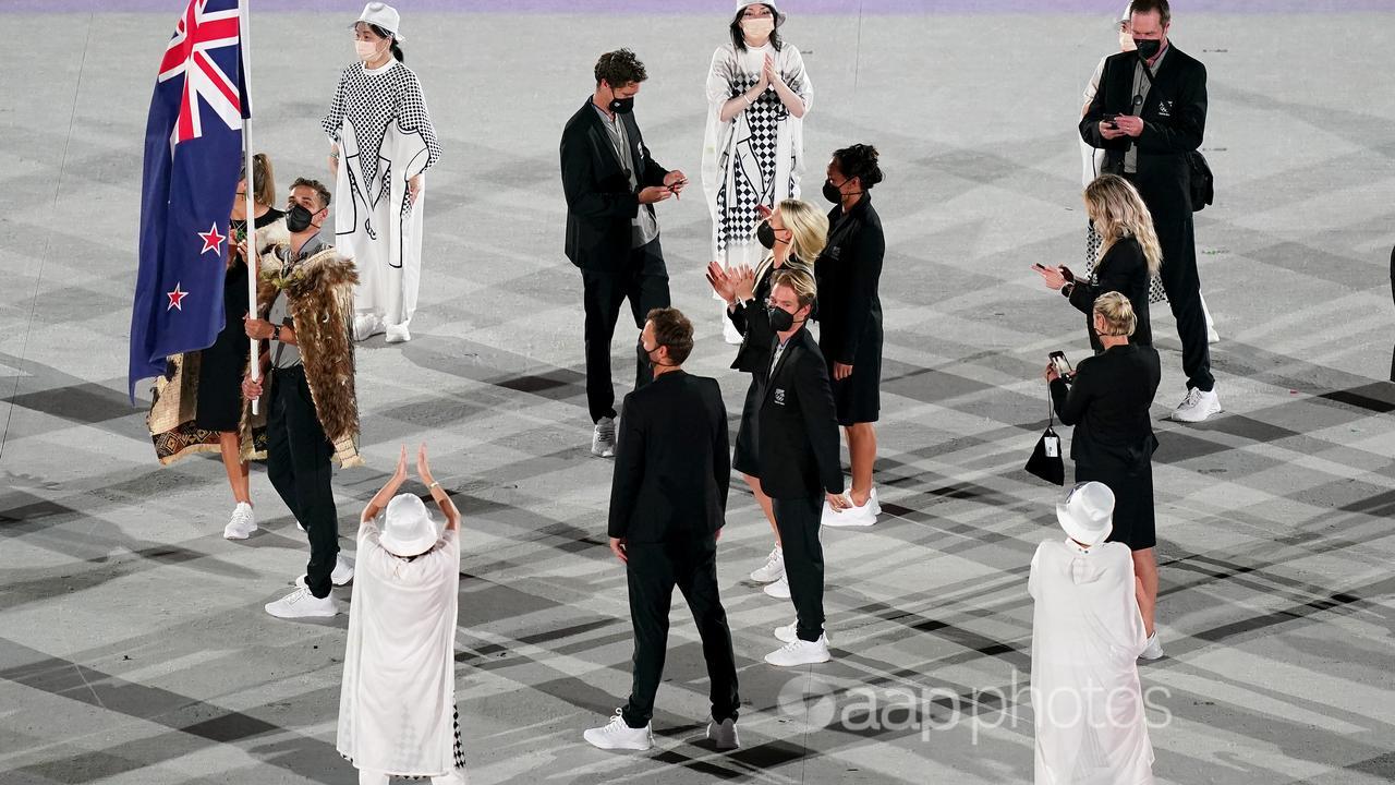 NZ athletes walk out at the opening ceremony of the Tokyo 2020 games.